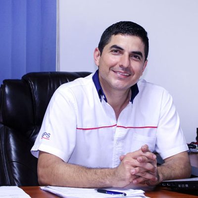 A young man with laptop Smiling man with laptop at home
